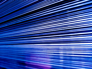 blue reflective metal lines texture in perspective.