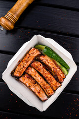 BBQ Pork Ribs in Takeaway Box Delivery concept