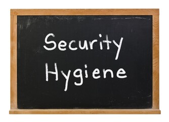 Security hygiene written in white chalk on a black chalkboard isolated on white