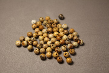 Small beads made of natural jasper. To create jewelry. 