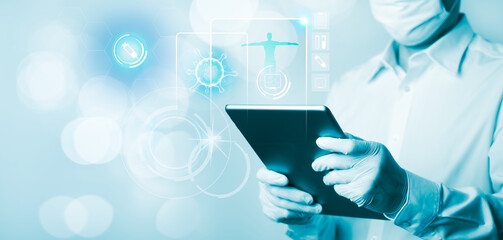 Medicine doctor using tablet computer with virtual interface of Medical science and Medicine technology
