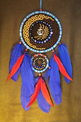 A beautiful dream catcher with natural stones.