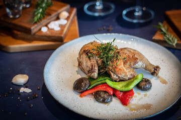 Coq au vin - French dish of chicken, baconm mushrooms and vegetables