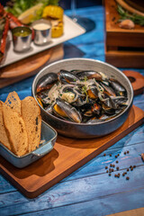 Mussels panorama with wine, and toasts