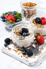 healthy creamy dessert with fresh berries, vertical