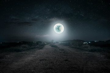 On the gravel road on a beautiful full moon night