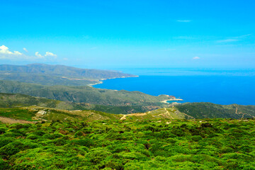 Fototapeta na wymiar View of the west coast of Andros, famous Cycladic island, in the heart of the Aegean Sea, near Gavrio bay