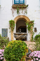 Fototapeta na wymiar Courtyard garden of Viana Palace in Cordoba, Andalusia, Spain.