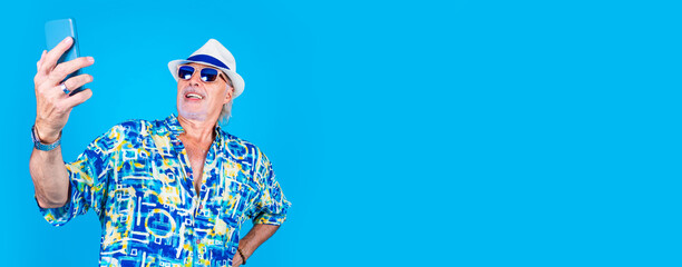 Senior caucasian man using smartphone  advertising copyspace background