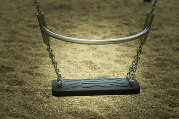 empty swing on a playground