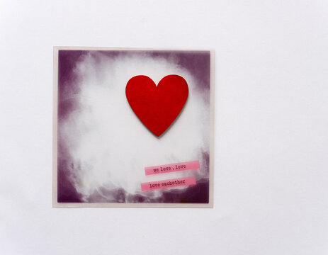isolated themed photo overlay with hand-painted wooden heart on a light background and plenty of space for copy or text