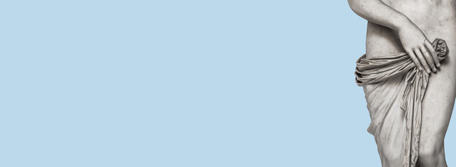 Banner with ancient marble statue with beautiful body lines of a young Roman Italian or Greek woman of Renaissance Era at solid blue sky background with copy space. Concept of culture and art. © neurobite