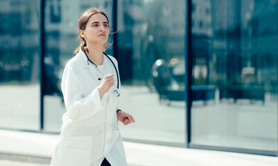 excited female doctor rushes to provide first aid to the patient.