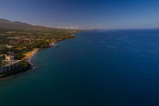 A high definition aerial view of a beach on the island of Maui in the Hawaiian islands.