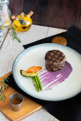 Grill Wagyu beef tenderloin with mashed Japanese potato, asparagus, red wine sauce