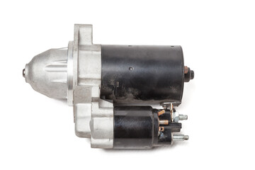 Starter of an internal combustion engine New Spare part for car on a white background. Spare parts catalog