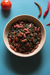Red kidney beans and black urad or kaali dal in a bowl with use of selective focus - obrazy, fototapety, plakaty