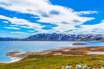 Fototapeta na wymiar Amazing Vavatn lake panorama rough landscape boulders mountains Hemsedal Norway.