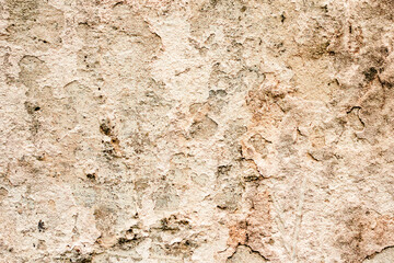 Texture of a concrete wall with cracks and scratches which can be used as a background