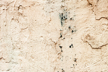Texture of a concrete wall with cracks and scratches which can be used as a background