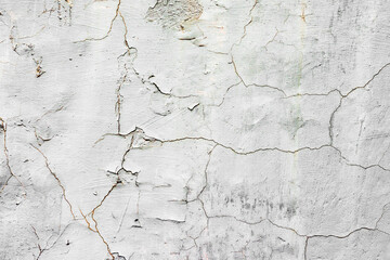 Texture of a concrete wall with cracks and scratches which can be used as a background