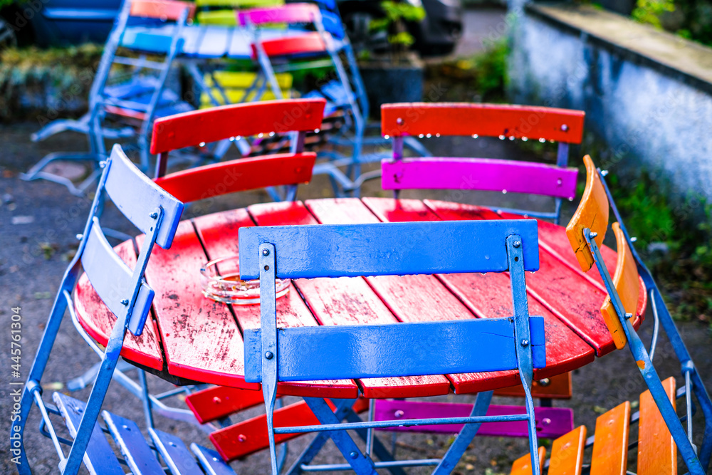 Wall mural colorful folding chairs at a beergarden