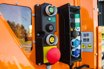 Orange garbage truck instrument table.