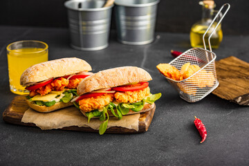 Chicken sandwich. Chicken burger with vegetables. - obrazy, fototapety, plakaty