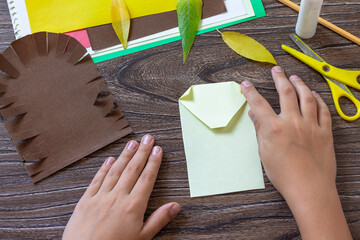 Instruction step 5. Postcard hedgehog with an apple on a wooden table. Handmade. Project of children's creativity, handicrafts, crafts for kids. © elena_hramowa