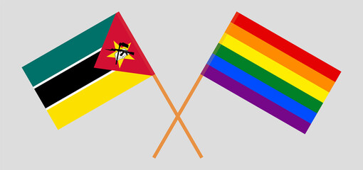 Crossed flags of Mozambique and LGBTQ. Official colors. Correct proportion