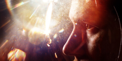 Double exposure portrait of futuristic astronaut in spacesuit. Astronomy conception. Distant galaxies and deep space. Spaceman In Outer Space. © KDdesignphoto