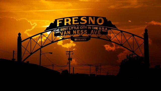 Fresno Gate Silhouette At Sunset ,Time Lapse with Red Sun and Fiery Sky, California