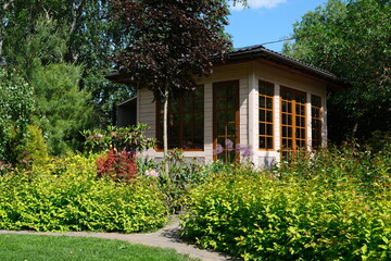 modern gazebo in the summer garden