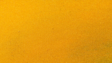 Gold glitter abstract background. Golden textured surface. Minimalism