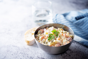 Potatoes green peas carrots sausage salad with mayonnaise