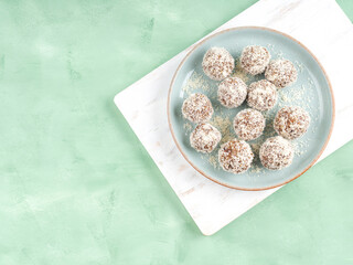Home made energy protein balls with coconut flakes and nut butter