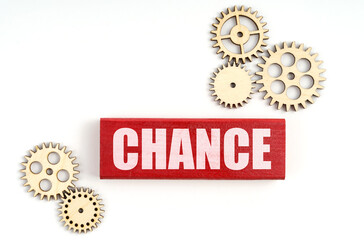 On a white background, gears and jenga with the inscription - CHANCE