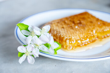 Natural honey with roses and citruses
