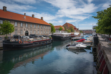 Fototapeta na wymiar Christians Brygge canal and boats - Copenhagen, Denmark
