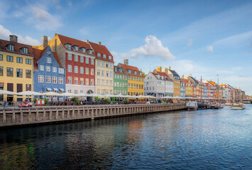 Fototapeta na wymiar Famous Nyhavn port and waterfront - colorful postcard view - Copenhagen, Denmark