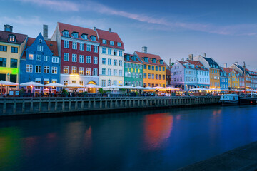 Fototapeta na wymiar Nyhavn port and waterfront at sunset - Copenhagen, Denmark