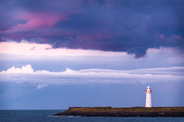 lighthouse on the coast of the atlantic ocean