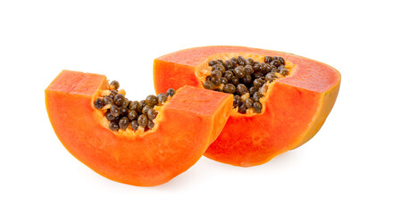 whole and half of ripe papaya fruit with seeds isolated on white background