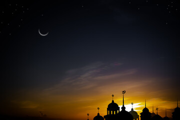 Fototapeta na wymiar Ramadan kareem religion symbols. Mosques Dome in twilight night with Crescent Moon and sky dark black background. for eid al-fitr, arabic, Eid al-adha, new year muharram concept.