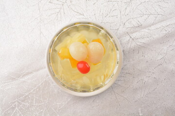 chilled sweet lychee peach pudding jelly with fresh fruit in cocktail glass asian healthy Halal dessert menu