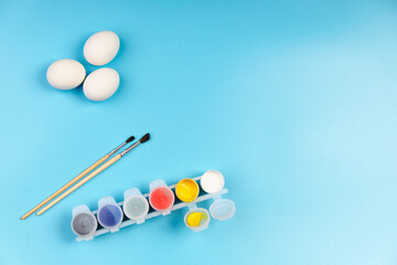 Eggs for Easter drawing set painting blue background