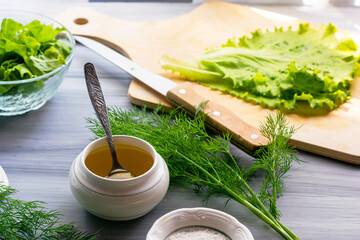 olive oil salt salad sliced on a cutting board on the table