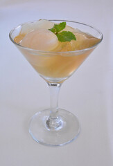 chilled sweet lychee peach pudding jelly with fresh fruit in cocktail glass asian healthy Halal dessert menu