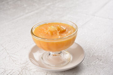 chilled sweet yellow mango fresh fruit sago puree soup with pomelo in cocktail glass asian healthy...
