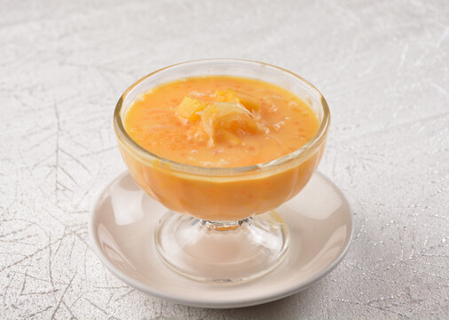 chilled sweet yellow mango fresh fruit sago puree soup with pomelo in cocktail glass asian healthy Halal dessert menu